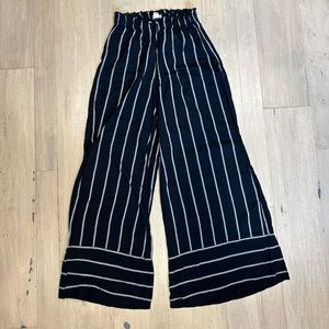Billabong wide leg pants size L have a little bleach stain on waist